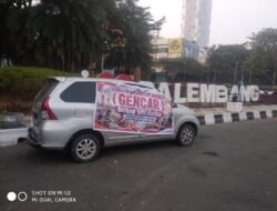 Dampak Kabut Asap Karhutla, GENCAR Bagikan 1.000 Masker Gratis untuk Warga Palembang